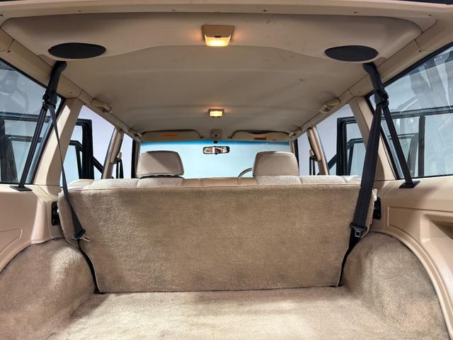 ジープ・チェロキー スポーツ　前期スポーツ・４ＷＤ・Ｂｌｕｅｔｏｏｔｈオーディオ・２インチリフトアップ・モスグリーン・背面タイヤ（20枚目）