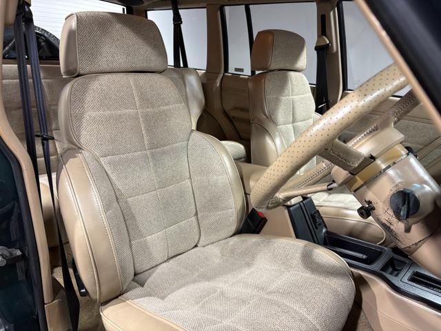 ジープ・チェロキー スポーツ　前期スポーツ・４ＷＤ・Ｂｌｕｅｔｏｏｔｈオーディオ・２インチリフトアップ・モスグリーン・背面タイヤ（26枚目）