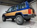 スポーツ　前期スポーツ・４ＷＤ・同色オールペン済・ウッドシート施工済・新品前後メッキバンパー・新品メッキグリル・新品メッキドアハンドル・ＢＦグッドリッチオールテレーンタイヤ・デイトナホイール新品・ネイビー（9枚目）