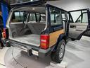スポーツ　前期スポーツ・４ＷＤ・同色オールペン済・ウッドシート施工済・新品前後メッキバンパー・新品メッキグリル・新品メッキドアハンドル・ＢＦグッドリッチオールテレーンタイヤ・デイトナホイール新品・ネイビー（13枚目）