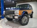 スポーツ　前期スポーツ・４ＷＤ・同色オールペン済・ウッドシート施工済・新品前後メッキバンパー・新品メッキグリル・新品メッキドアハンドル・ＢＦグッドリッチオールテレーンタイヤ・デイトナホイール新品・ネイビー（49枚目）