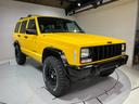 ジープ・チェロキー スポーツ　後期スポーツ・４ＷＤ・新品ＢＦグッドリッチオールテレーンタイヤ・デイトナブラックホイール・ルーフレール・自社オールペン済み・イエロー（6枚目）