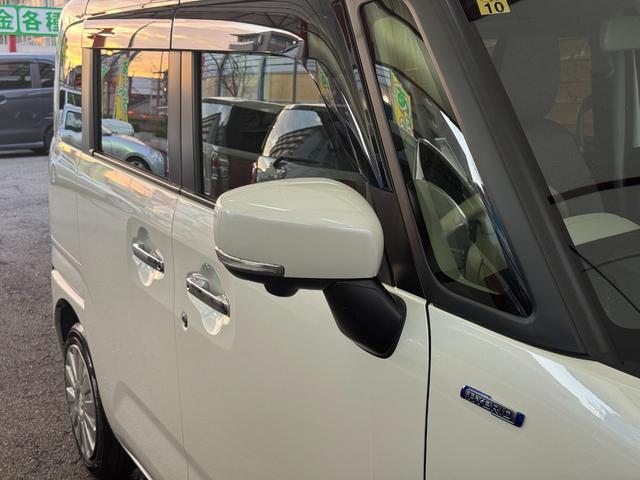 ワゴンＲスマイル ハイブリッドＸ　両側電動スライドドア　純正９インチナビ　全周囲カメラ　フルセグ　Ｂｌｕｅｔｏｏｔｈ　ヘッドアップディスプレイ　運転席シートヒーター　オートエアコン　アダプティブクルーズ　障害物センサー　フロアマット（7枚目）