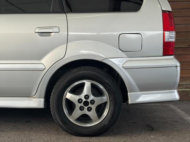 シャリオグランディス ツーリング　７人乗り　ＣＤ／ＭＤプレイヤー　ＥＴＣ　オートライト　電動格納ミラー　ルーフレール　純正１５インチアルミホイール　フロアマット（49枚目）