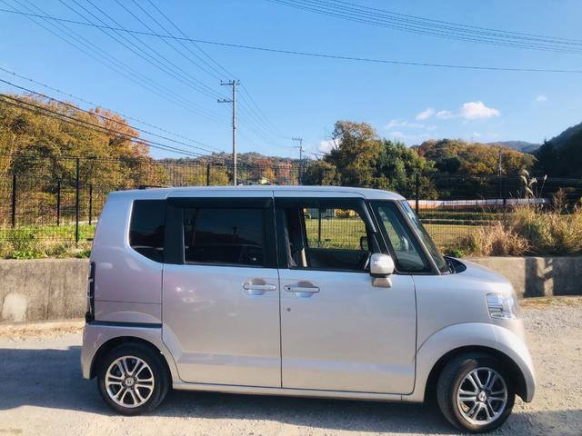 N-BOX G・Lパッケージ 電動格納式ミラー I-STOP ベンチ席 全席PW ナビテレビ 1セグ 衝突安全ボディ AAC 横滑り防止 スマートキー DVD再生 メモリーナビ ABS ETC USB接続 キーレスE(5枚目)