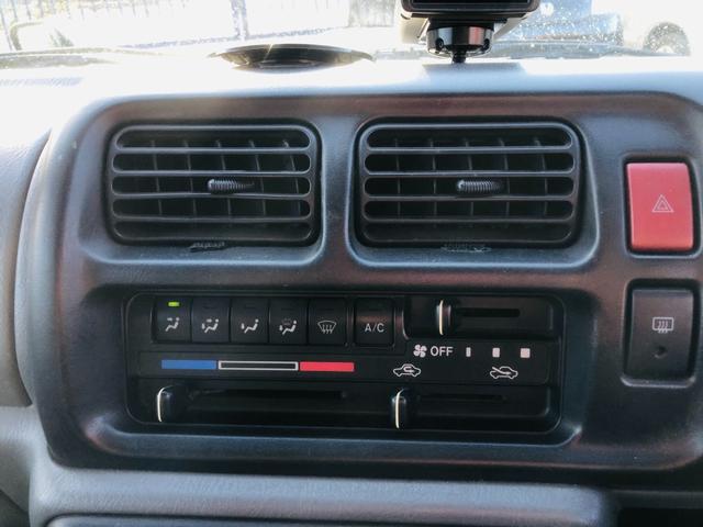 ジムニー ランドベンチャー　修復歴無し　５速ＭＴ　前席パワーウインドウ　助手席エアバック　運転席エアバッグ　４ＷＤ車　キーレス付　ＰＳ　衝突安全ボディ　ＡＢＳ付　ＥＴＣ　ターボー　ＡＴエアコン（58枚目）