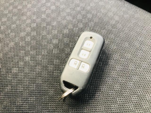 N-BOXカスタム G SSパッケージ 両側パワ-スライドドア オートミラー スマ-トキ- Bカメ ETC付き エアコン ESC A-STOP パワーウィンドウ 運転席助手席エアバッグ DVD TV ABS サイドカーテンエアバック(26枚目)