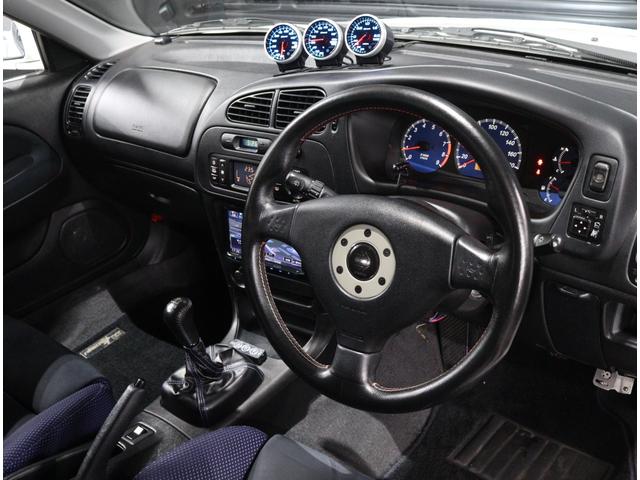 ランサー ＧＳＲエボリューションＶＩ　当店お客様直接買取　屋内ガレージ保管　禁煙車　タイミングベルト交換済　クラッチ交換済　トミーマキネンエディションフロントバンパー　ＲＡＹＳ１７インチＡＷ　オーリンズ車高調　フジツボマフラー（5枚目）