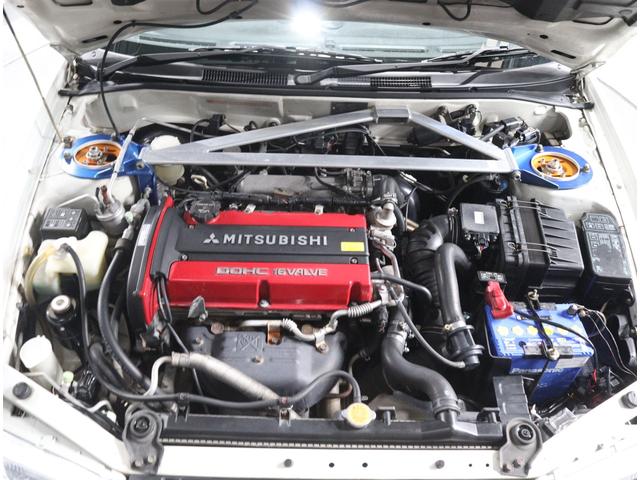 ランサー ＧＳＲエボリューションＶＩ　当店お客様直接買取　屋内ガレージ保管　禁煙車　タイミングベルト交換済　クラッチ交換済　トミーマキネンエディションフロントバンパー　ＲＡＹＳ１７インチＡＷ　オーリンズ車高調　フジツボマフラー（9枚目）