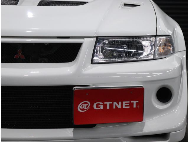 ランサー ＧＳＲエボリューションＶＩ　当店お客様直接買取　屋内ガレージ保管　禁煙車　タイミングベルト交換済　クラッチ交換済　トミーマキネンエディションフロントバンパー　ＲＡＹＳ１７インチＡＷ　オーリンズ車高調　フジツボマフラー（11枚目）