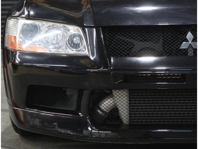 ランサー ＧＳＲエボリューションＶＩＩ　当店お客様直接買取　ワンオーナー　フルノーマル　純正レカロセミバケットシート／ブレンボブレーキキャリパー／１７インチＡＷ／ＭＯＭＯステアリング　ＨＩＤヘッドライト　リヤスポイラー（10枚目）