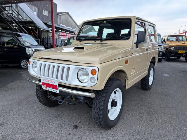 ジムニー ワイルドウインド　４ＷＤ　オールペイント　ウッドハンドル　シートカバー　スペアタイヤカバー　前後ステンレスパンパー　ホワイトホイール　ＭＴタイヤ　ＥＴＣ　ＣＤデッキ（5枚目）