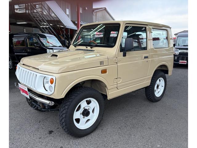 ジムニー ワイルドウインド　４ＷＤ　オールペイント　ウッドハンドル　シートカバー　スペアタイヤカバー　前後ステンレスパンパー　ホワイトホイール　ＭＴタイヤ　ＥＴＣ　ＣＤデッキ（6枚目）
