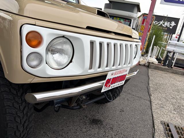 ジムニー ワイルドウインド　４ＷＤ　オールペイント　ウッドハンドル　シートカバー　スペアタイヤカバー　前後ステンレスパンパー　ホワイトホイール　ＭＴタイヤ　ＥＴＣ　ＣＤデッキ（15枚目）