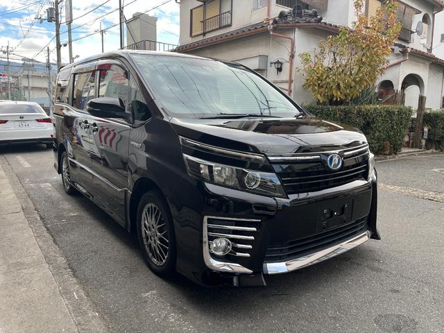 ヴォクシー ハイブリッドZS 両側電動スライド 9インチナビ フルセグTV Bluetooth フリップダウンモニタ 衝突回避支援システム 車線逸脱警報システム オートマチックハイビーム ETC バックカメラ ドラレコ(2枚目)