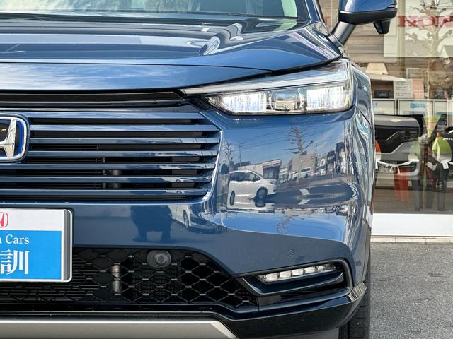 ヴェゼル ｅ：ＨＥＶ　Ｚ　Ｈセンシング　ＢＳＩ　アダプティブＤビーム　オートリトラミラー　ナビ装着用スペシャルＰＫＧ　ＡＣＣ　ＬＥＤヘッド　前席シートヒータ　電動テールゲート　本革巻ステアリング　純正１８インチＡＷ（17枚目）
