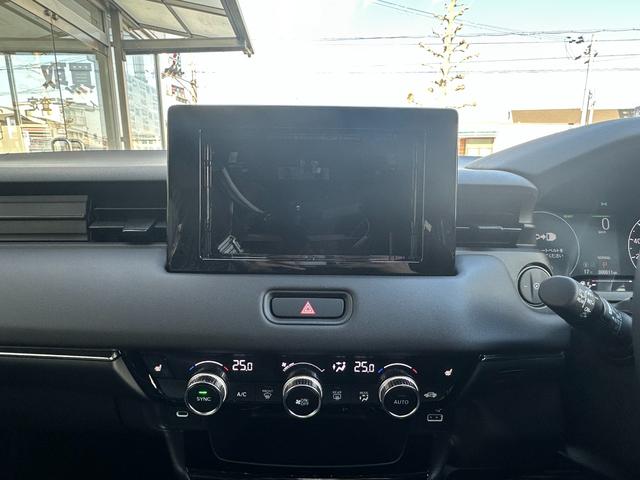 ヴェゼル ｅ：ＨＥＶ　Ｚ　Ｈセンシング　ＢＳＩ　アダプティブＤビーム　オートリトラミラー　ナビ装着用スペシャルＰＫＧ　ＡＣＣ　ＬＥＤヘッド　前席シートヒータ　電動テールゲート　本革巻ステアリング　純正１８インチＡＷ（35枚目）