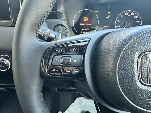 ヴェゼル ｅ：ＨＥＶ　Ｚ　Ｈセンシング　ＢＳＩ　アダプティブＤビーム　オートリトラミラー　ナビ装着用スペシャルＰＫＧ　ＡＣＣ　ＬＥＤヘッド　前席シートヒータ　電動テールゲート　本革巻ステアリング　純正１８インチＡＷ（36枚目）