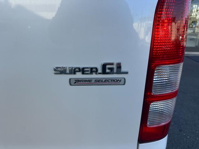 ハイエースバン ロングスーパーGLプライムセレ 助手席エアバック ストラーダナビ フルセグTV Bカメラ ETC Bluetooth CD DVD HID キーレス 障害物センサー フルフラットシート カーテン 両側スライドドア(23枚目)