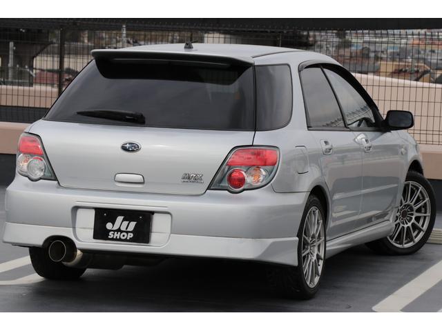 ＷＲＸ　５速マニュアル　社外マフラー　ＳＴＩ１７インチアルミホイール　キセノンヘッドライト　社外スピーカー　社外ホーン　ＥＴＣ　キーレス(18枚目)