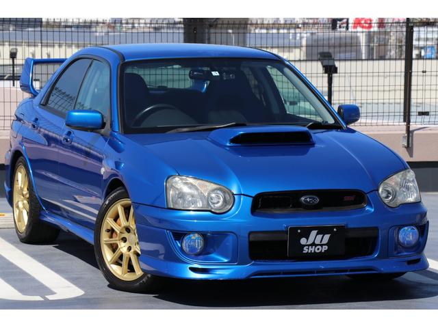 ＷＲＸ　ＳＴｉ　Ｅ型６速ＴＥＩＮ車高調柿本Ｒｅｇｕマフラー純正大型リヤスポイラーＢｒｅｍｂｏブレーキＤｅｆｉ３連メータナビＴＶ／ｃｕｓｃｏ　バッテリーステーＨＫＳエアクリＬＡＩＬＥ　／　Ｂｅａｔｒｕｓｈプーリカバー(6枚目)