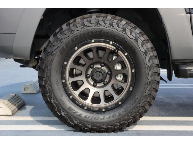 ハイラックスサーフ SSR-X アメリカンバージョン デルタフォース17インチアルミホイール/社外足廻り/タイヤ265/70/R17/Bluetooth対応/ETC/ナビ/フルセグTV/保証書/取説/キーレス/オートエアコン/オートライト(12枚目)