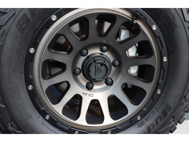 ハイラックスサーフ SSR-X アメリカンバージョン デルタフォース17インチアルミホイール/社外足廻り/タイヤ265/70/R17/Bluetooth対応/ETC/ナビ/フルセグTV/保証書/取説/キーレス/オートエアコン/オートライト(13枚目)