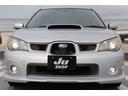 ＷＲＸ　５速マニュアル　社外マフラー　ＳＴＩ１７インチアルミホイール　キセノンヘッドライト　社外スピーカー　社外ホーン　ＥＴＣ　キーレス(12枚目)