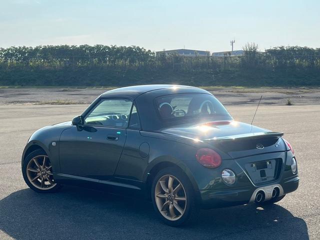 コペン アクティブトップ　ＥＴＣ　社外ナビ　パナスポーツレーシングアルミホイール　純正オプションマフラーヒートガード　ＢＬＵＥＴＯＯＴＨ　赤革シート　純正ＭＯＭＯステリング　キーレスエントリー　フルセグ（6枚目）
