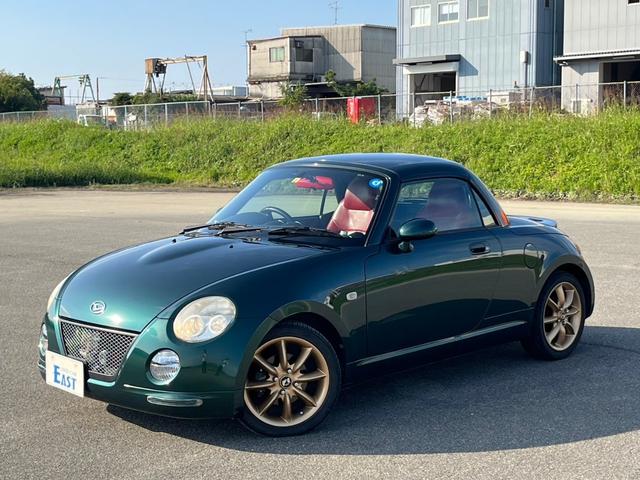コペン アクティブトップ　ＥＴＣ　社外ナビ　パナスポーツレーシングアルミホイール　純正オプションマフラーヒートガード　ＢＬＵＥＴＯＯＴＨ　赤革シート　純正ＭＯＭＯステリング　キーレスエントリー　フルセグ（10枚目）