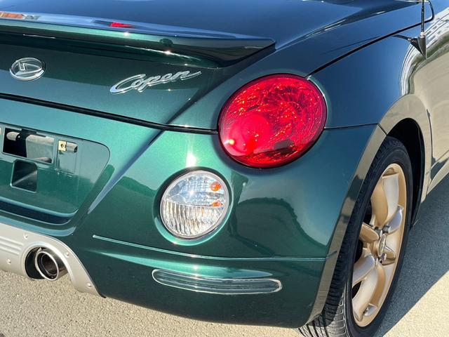 コペン アクティブトップ　ＥＴＣ　社外ナビ　パナスポーツレーシングアルミホイール　純正オプションマフラーヒートガード　ＢＬＵＥＴＯＯＴＨ　赤革シート　純正ＭＯＭＯステリング　キーレスエントリー　フルセグ（26枚目）