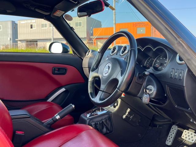 コペン アクティブトップ　ＥＴＣ　社外ナビ　パナスポーツレーシングアルミホイール　純正オプションマフラーヒートガード　ＢＬＵＥＴＯＯＴＨ　赤革シート　純正ＭＯＭＯステリング　キーレスエントリー　フルセグ（31枚目）