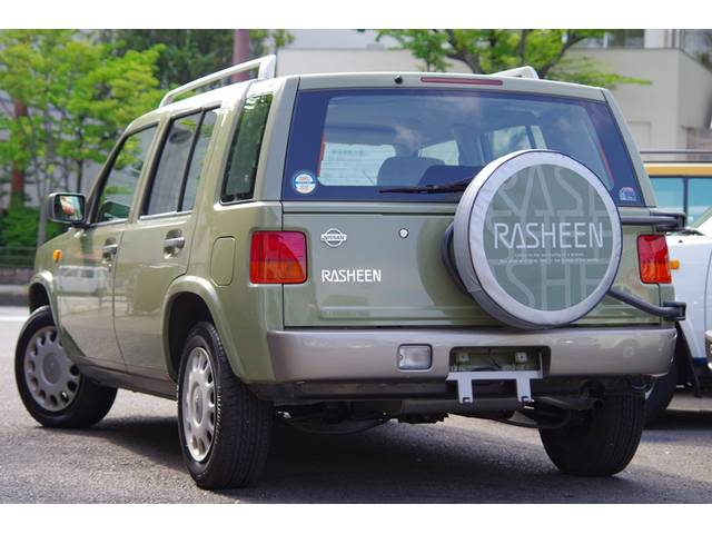 日産ラシーンタイプII 再生整備 新品背面タイヤカバー ボディー