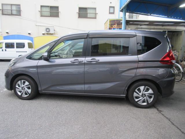 フリードハイブリッド ハイブリッド・Gホンダセンシング 純正ナビ フルセグTV Bluetooth 両側電動スライドドア ETC バックカメラ LEDライト スマートキー DVD CD Fピラー修復 クルーズコントロール(6枚目)