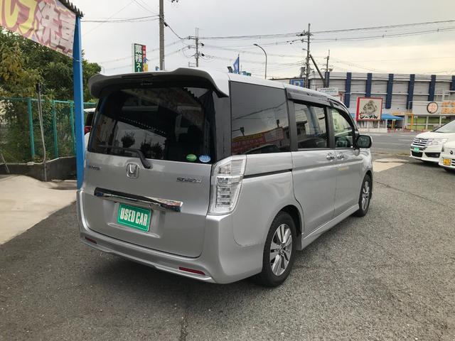 ステップワゴンスパーダ Z インターナビセレクション Rカメラ 横滑り防止機能 オートクルーズ 衝突安全ボディ パワステ フルセグ スマ-トキ- ABS パワーウィンドウ HDDナビ エアバッグ ウォークスルー フルフラットシート Wエアコン ナビ・TV(11枚目)