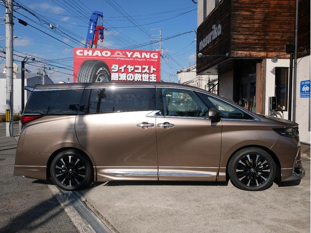 アルファードハイブリッド エグゼクティブラウンジ　登録済未使用車　寒冷地仕様　ニュートラルベージュ　ユニバーサルステップ　モデリスタエアロパーツセット　１９インチアルミホイール　デジタルインナーミラー　おくだけ充電　エグゼクティブフロアマットセット（7枚目）