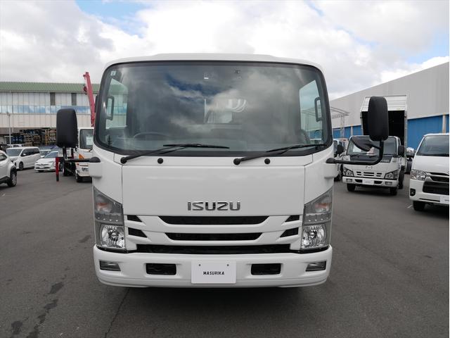 エルフトラック プレス式パッカー車　連続スイッチ　ターボ　３ｔ　塵芥車　プレス式　極東製（ＧＢ６９－２７Ｈ－Ｓ）６．９立米　６速マニュアル／３ペダル　汚水タンク　ＨＳＡ（坂道発進補助装置）　横滑り防止装置　カラーバックモニター　前後ドラレコ　新品タイヤ×６本（3枚目）