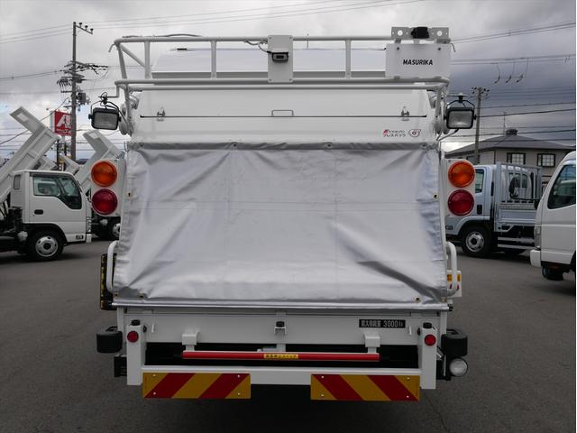 エルフトラック プレス式パッカー車　連続スイッチ　ターボ　３ｔ　塵芥車　プレス式　極東製（ＧＢ６９－２７Ｈ－Ｓ）６．９立米　６速マニュアル／３ペダル　汚水タンク　ＨＳＡ（坂道発進補助装置）　横滑り防止装置　カラーバックモニター　前後ドラレコ　新品タイヤ×６本（7枚目）