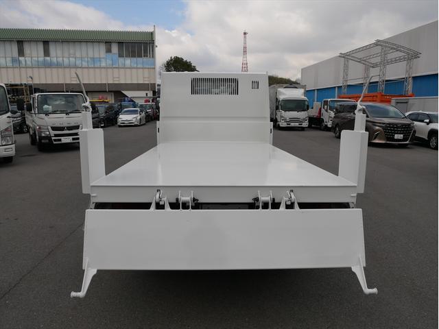 エルフトラック ２ｔ　高床ダンプ　極東開発製　（ＤＤ０２－３１）　ＨＳＡ（坂道発進補助装置）　５速マニュアル／３ペダル　中間ピン２個　４ＨＬ１ディーゼル４７７０ｃｃエンジン　三方開　左電動格納ミラー　フロントタレゴム新調　ヘッドライトレベライザー　ＬＥＤ作業灯（12枚目）