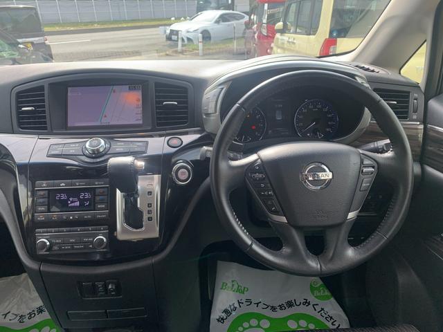 エルグランド ２５０ハイウェイスターＳ　メーカーＯＰナビ　フルセグＴＶ　アラウンドビューモニタ　フリップダウンモニター　両側パワースライドドア　ハーフレザーシート　オットマン　コーナーセンサー　オートライト　ＬＥＤヘッドライト　スマートキー（12枚目）