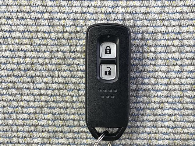 Ｎ－ＷＧＮ Ｌホンダセンシング　純正８インチメモリーナビ・バックカメラ・Ｂｌｕｅｔｏｏｔｈ・フルセグＴＶ・ＤＶＤ／ＣＤ再生・ＥＴＣ・リヤセンサー・シートヒーター・スマートキー・ＬＥＤヘッドライト・衝突被害軽減ブレーキ（18枚目）