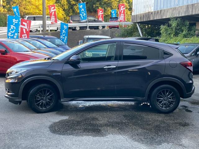 ヴェゼル ハイブリッドＸ　純正ナビＴＶ　クルコン　衝突軽減　バックカメラ　ＢＬＵＥＴＯＯＴＨ　ステアリモコン　ＬＥＤ　オートライト　フォグライト　社外１６ＡＷ　パドルシフト　フルフラット　ウィンカーミラー　スマートキー　ＥＴＣ（14枚目）