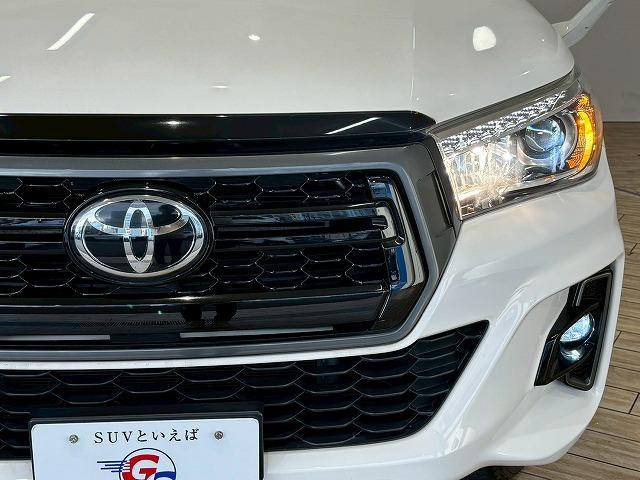 ハイラックス Ｚ“Ｂｌａｃｋ　Ｒａｌｌｙ　Ｅｄｉｔｉｏｎ”　トノカバ－　７インチナビ　フルセグテレビ　レーダークルーズコントロール　衝突軽減ブレーキ　車線逸脱防止　ＥＴＣ　スマートキー　プッシュスタート　オートエアコン　オートライト　ホワイトレタータイヤ（56枚目）