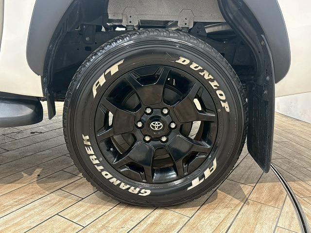ハイラックス Ｚ“Ｂｌａｃｋ　Ｒａｌｌｙ　Ｅｄｉｔｉｏｎ”　トノカバ－　７インチナビ　フルセグテレビ　レーダークルーズコントロール　衝突軽減ブレーキ　車線逸脱防止　ＥＴＣ　スマートキー　プッシュスタート　オートエアコン　オートライト　ホワイトレタータイヤ（70枚目）