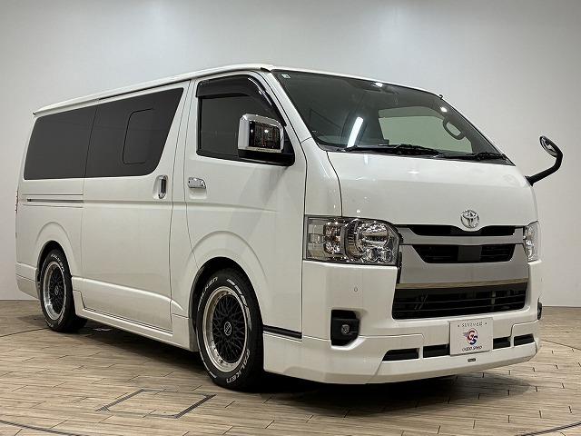 ハイエースバン スーパーＧＬダークプライム２　フローティングナビ　バックカメラ　モデリスタエアロ　衝突軽減ブレーキ　車線逸脱防止　助手席エアバック　ＡＣ１００Ｖ　オートハイビーム　オートライト　オートエアコン　プッシュスタート　フルセグテレビ（77枚目）