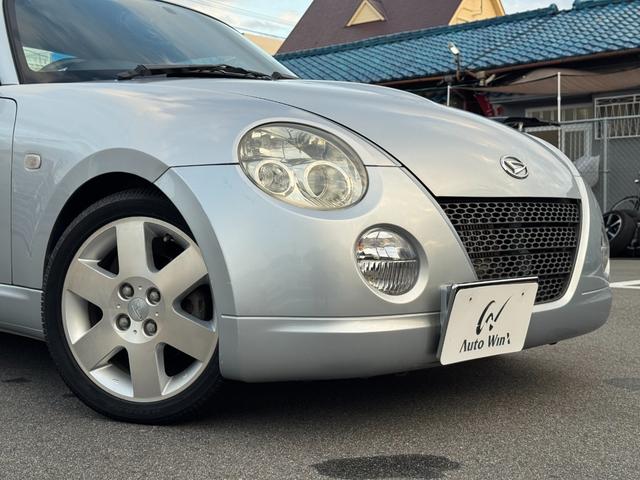コペン アクティブトップ 電動オープン DOHCターボ D-SPORTマフラー トランクスポイラー レザー調シートカバー LEDヘッドライト イエローフォグ 社外ナビ ETC キーレス 純正15インチホイール 車検令和9年6月(35枚目)