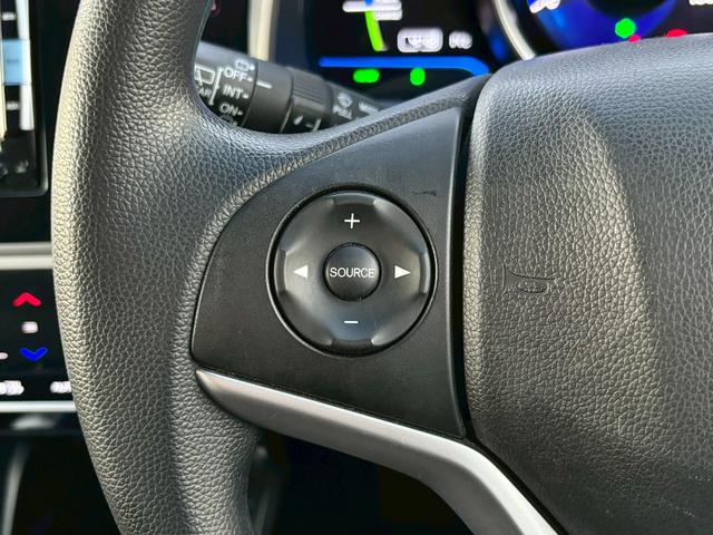 フィットハイブリッド Ｆパッケージ　ユーザー買取・純正ＳＤナビ・フルセグＴＶ・バックモニター・ＥＴＣ・オートライト・ＬＥＤヘッドライト・ナビ装着用スペシャルパッケージ・Ｆパッケージ・スマートキーシステム・電格ウィンカードアミラー（10枚目）