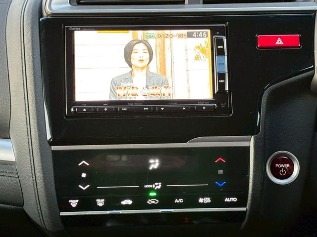 フィットハイブリッド Ｆパッケージ　ユーザー買取・純正ＳＤナビ・フルセグＴＶ・バックモニター・ＥＴＣ・オートライト・ＬＥＤヘッドライト・ナビ装着用スペシャルパッケージ・Ｆパッケージ・スマートキーシステム・電格ウィンカードアミラー（12枚目）