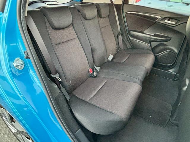 フィットハイブリッド Ｆパッケージ　ユーザー買取・純正ＳＤナビ・フルセグＴＶ・バックモニター・ＥＴＣ・オートライト・ＬＥＤヘッドライト・ナビ装着用スペシャルパッケージ・Ｆパッケージ・スマートキーシステム・電格ウィンカードアミラー（25枚目）