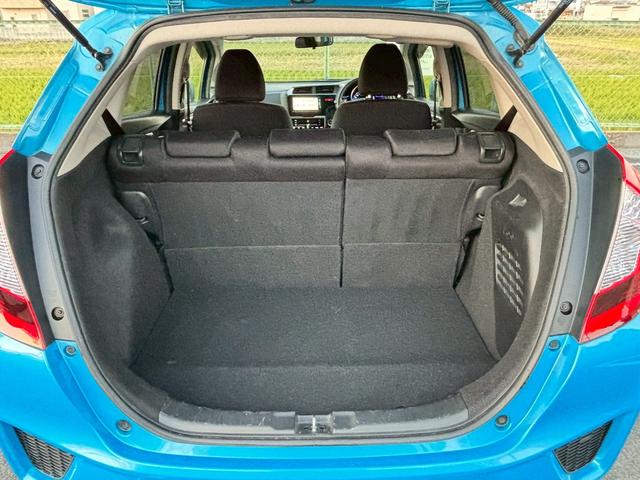 フィットハイブリッド Ｆパッケージ　ユーザー買取・純正ＳＤナビ・フルセグＴＶ・バックモニター・ＥＴＣ・オートライト・ＬＥＤヘッドライト・ナビ装着用スペシャルパッケージ・Ｆパッケージ・スマートキーシステム・電格ウィンカードアミラー（27枚目）